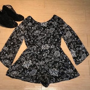 Floral black and white bell sleeved romper.